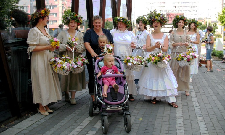 Poland: Sharing bouquets with random strangers - day of the Divine Mother of Herbs on the streets of the modern-day city of Szczecin